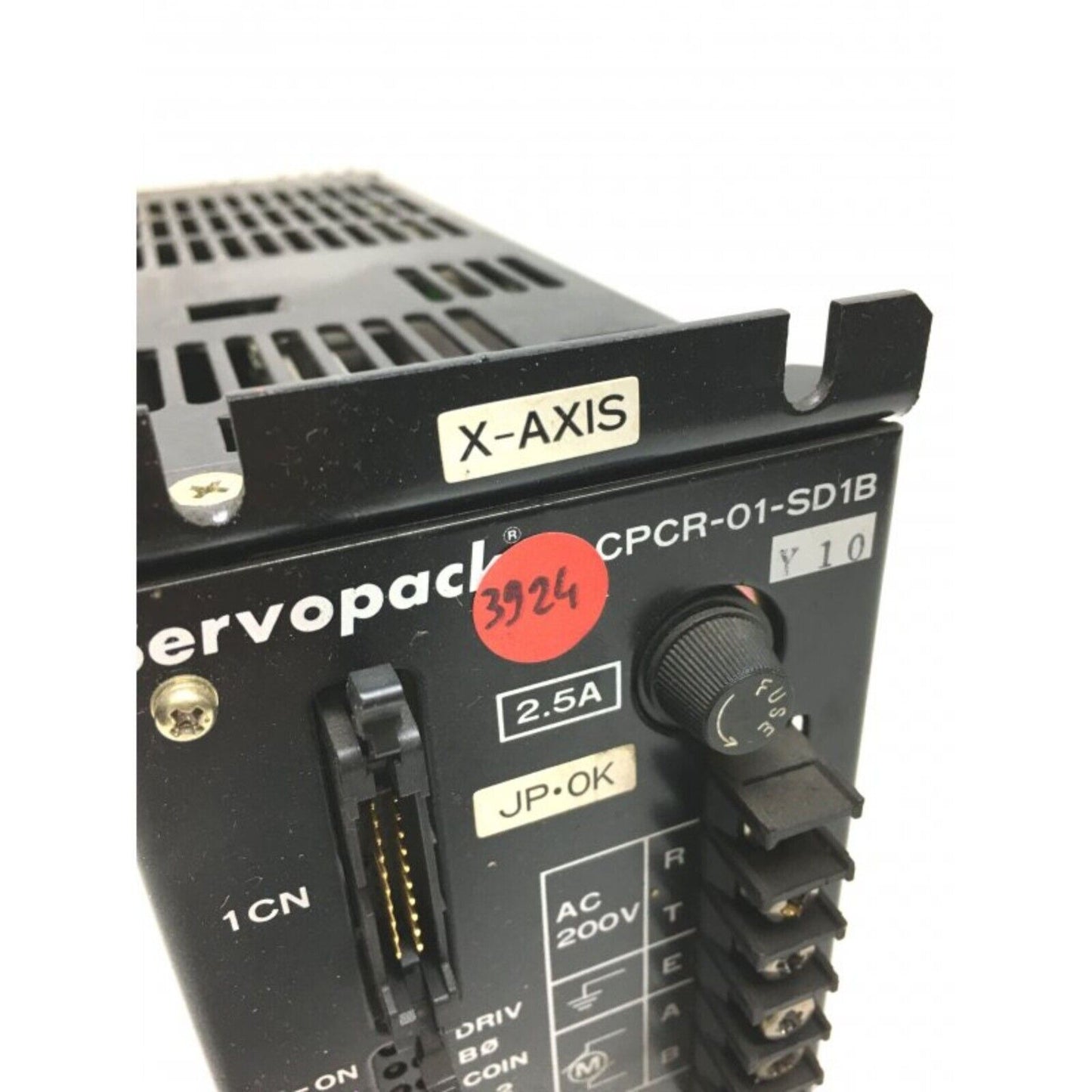 YASKAWA CPCR-01-SD1B Servo Drive, black. Features X-AXIS label, 2.5A, and industrial automation details.