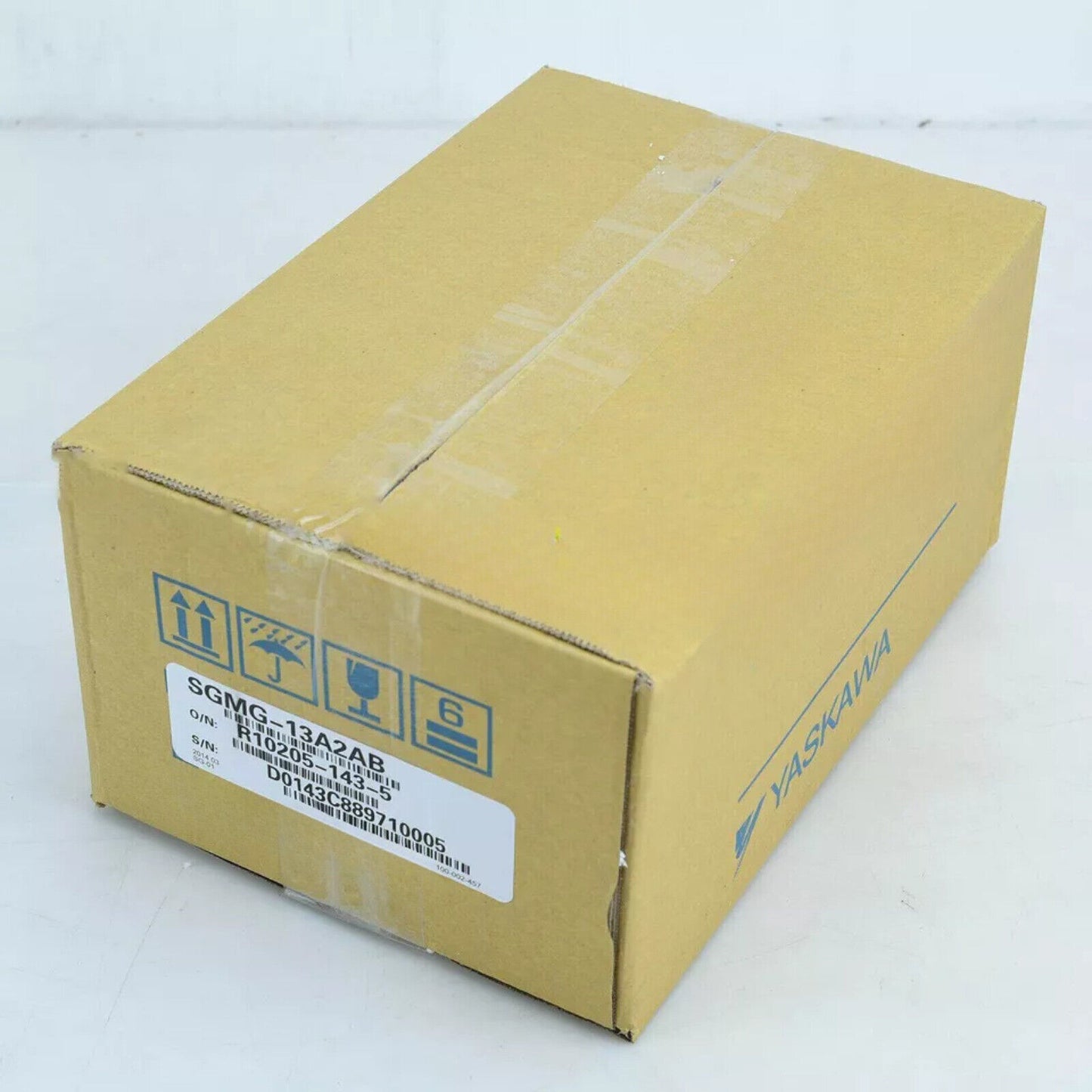 YASKAWA SGMG-13A2AB servo motor in box, industrial automation part, product packaging with label details