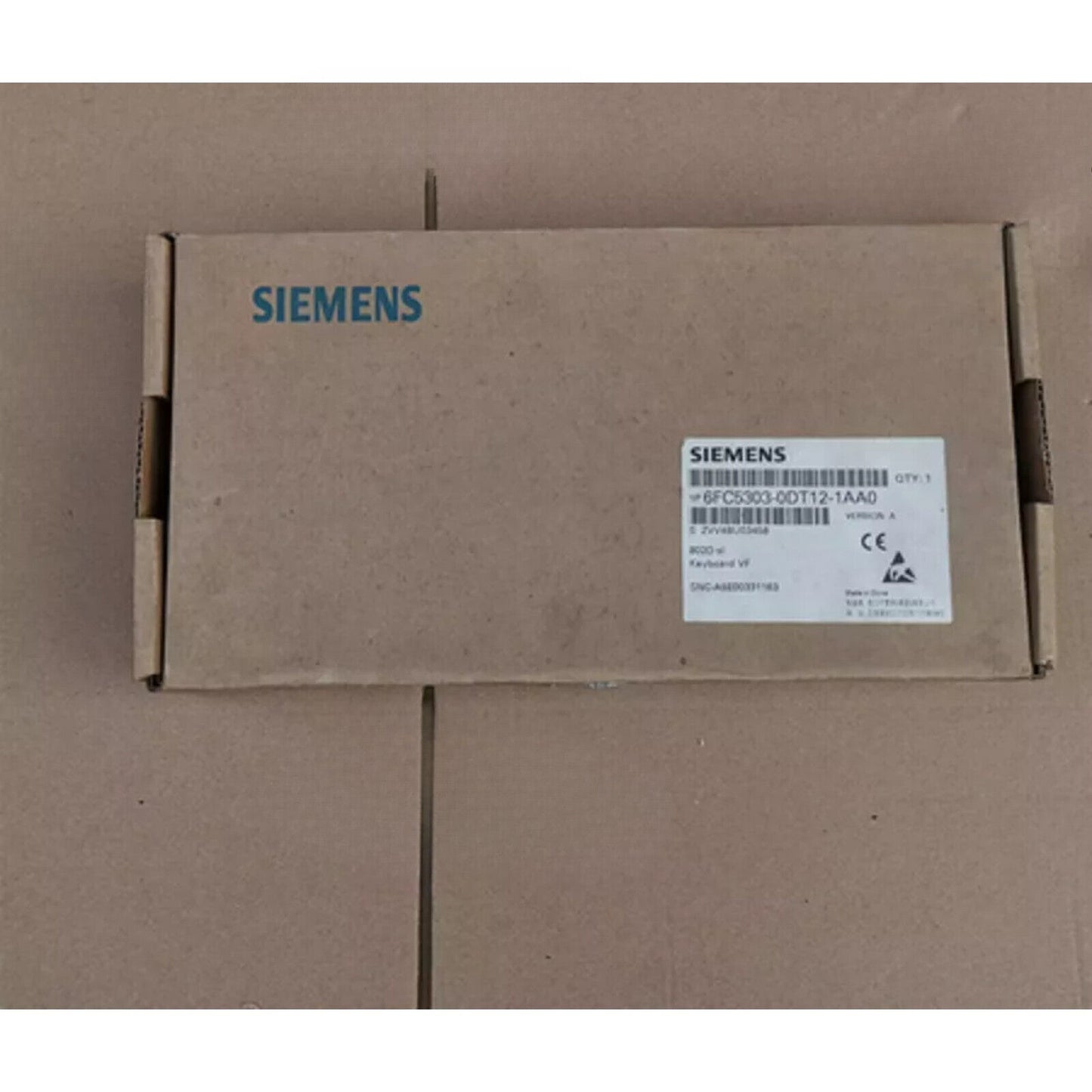 Siemens 6FC5303-0DT12-1AA0 industrial automation control panel part in box.