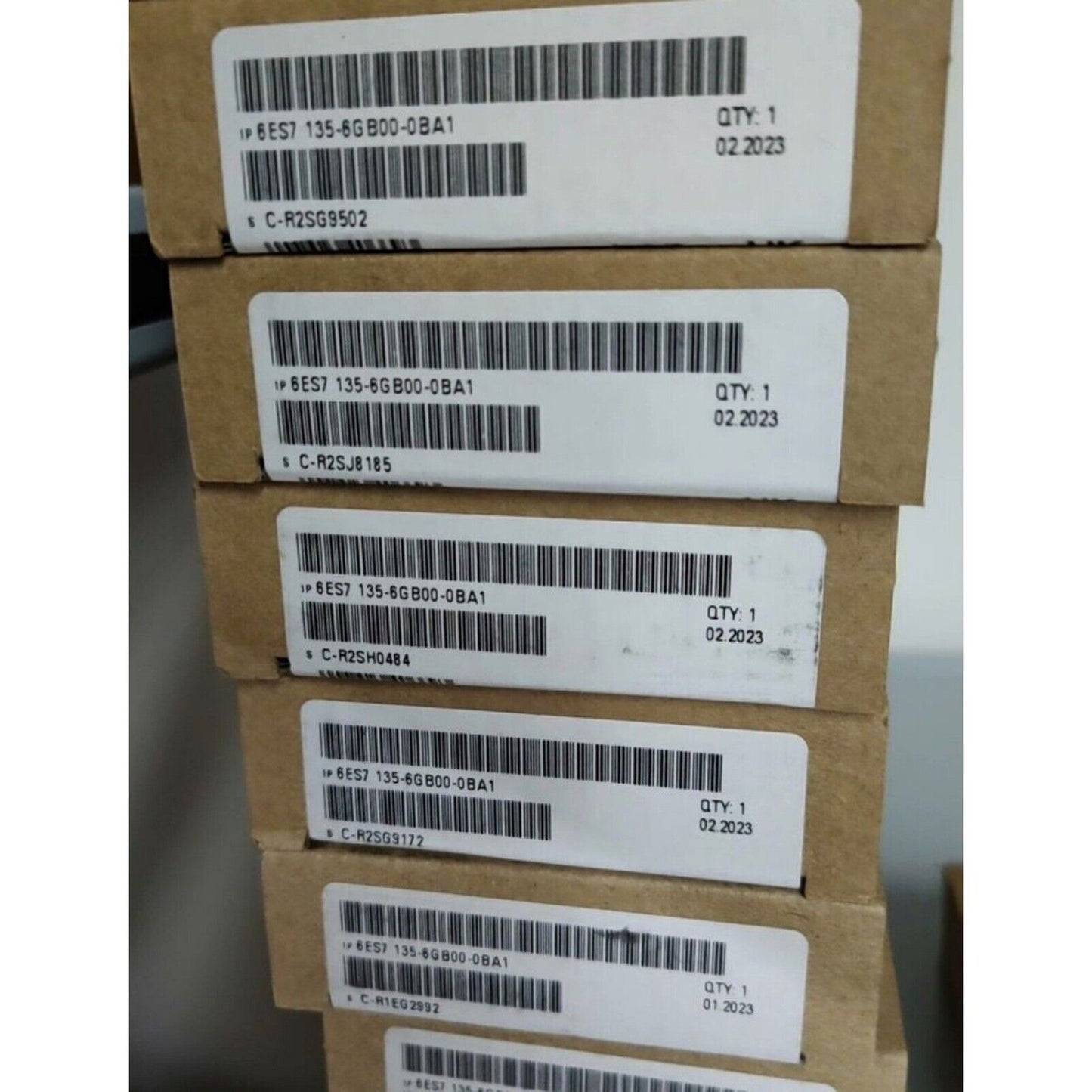 SIMATIC S7-1200 6ES7135-6GB00-0BA1 digital output modules in packaging, industrial automation parts.