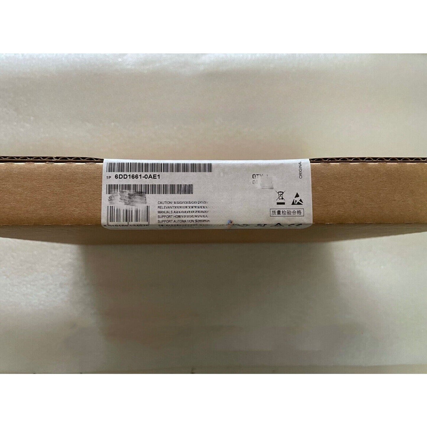 Siemens 6DD1661-0AE1 SIMATIC TDC Communications Module box, quality check label, industrial automation part.
