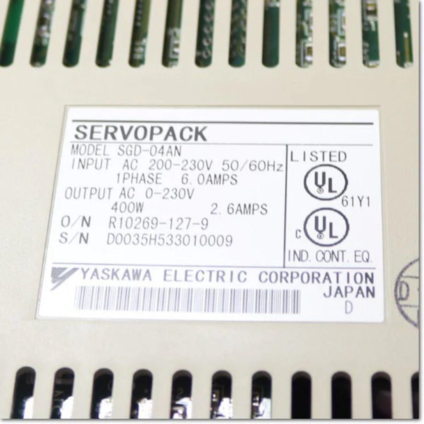 YASKAWA SGD-04AN Servo Motor drive unit label, industrial automation part with model number, input and output specifications.