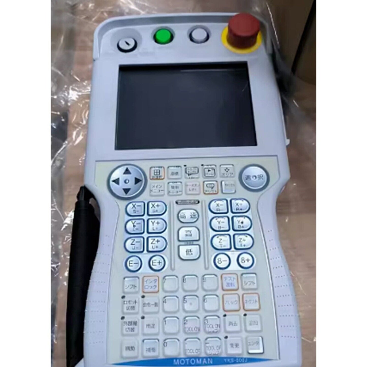 Yaskawa MOTOMAN JZRCR-YPP01-1 robot teach pendant controller, white handheld with buttons, and screen display, YKS-