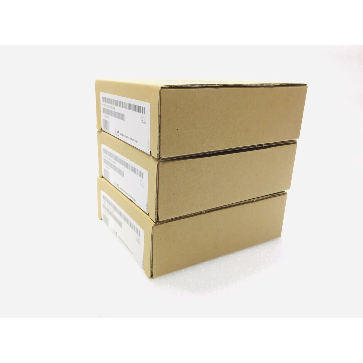 Stack of SIMATIC S7-300 PLC module boxes, industrial automation parts, brown boxes on white background.