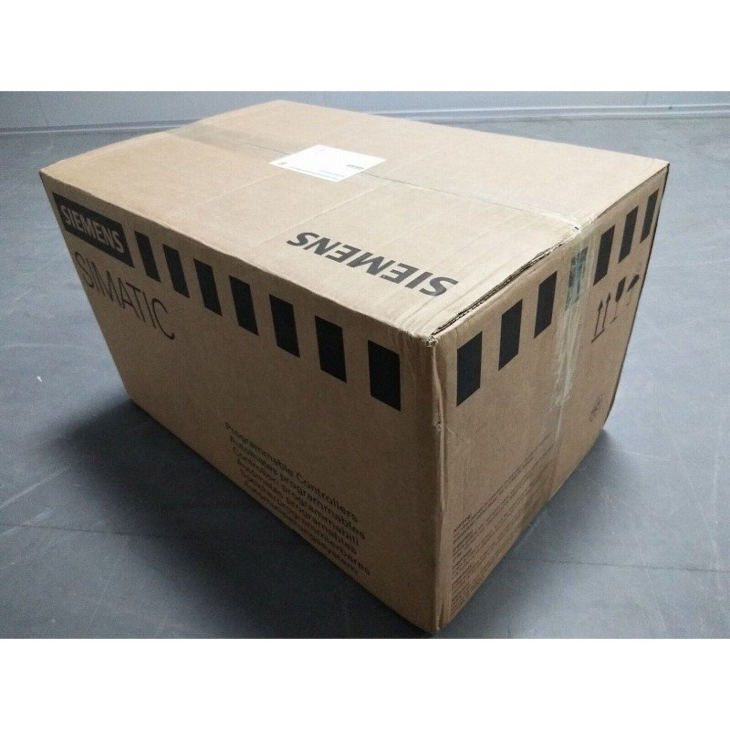 Siemens SIMATIC PLC packaging box, brown cardboard, industrial automation parts