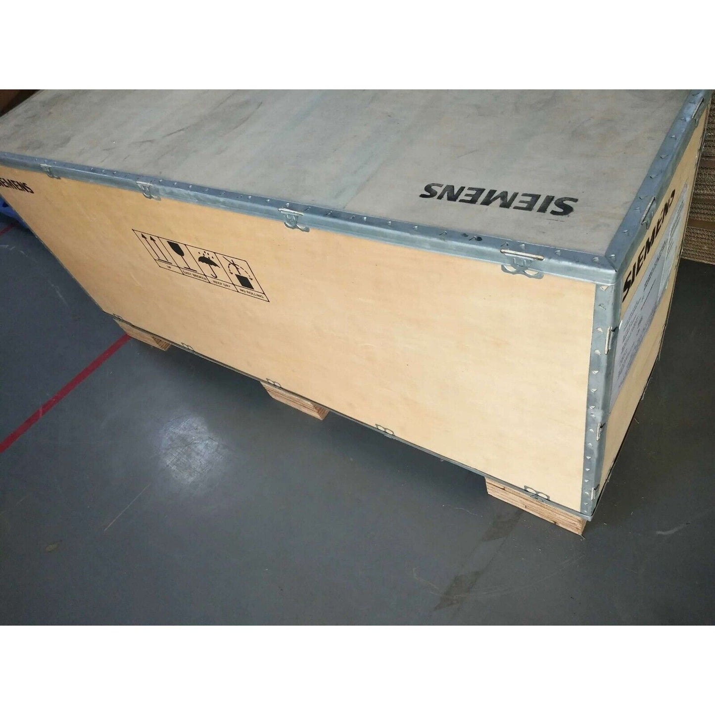 Siemens industrial automation product in wooden shipping crate.