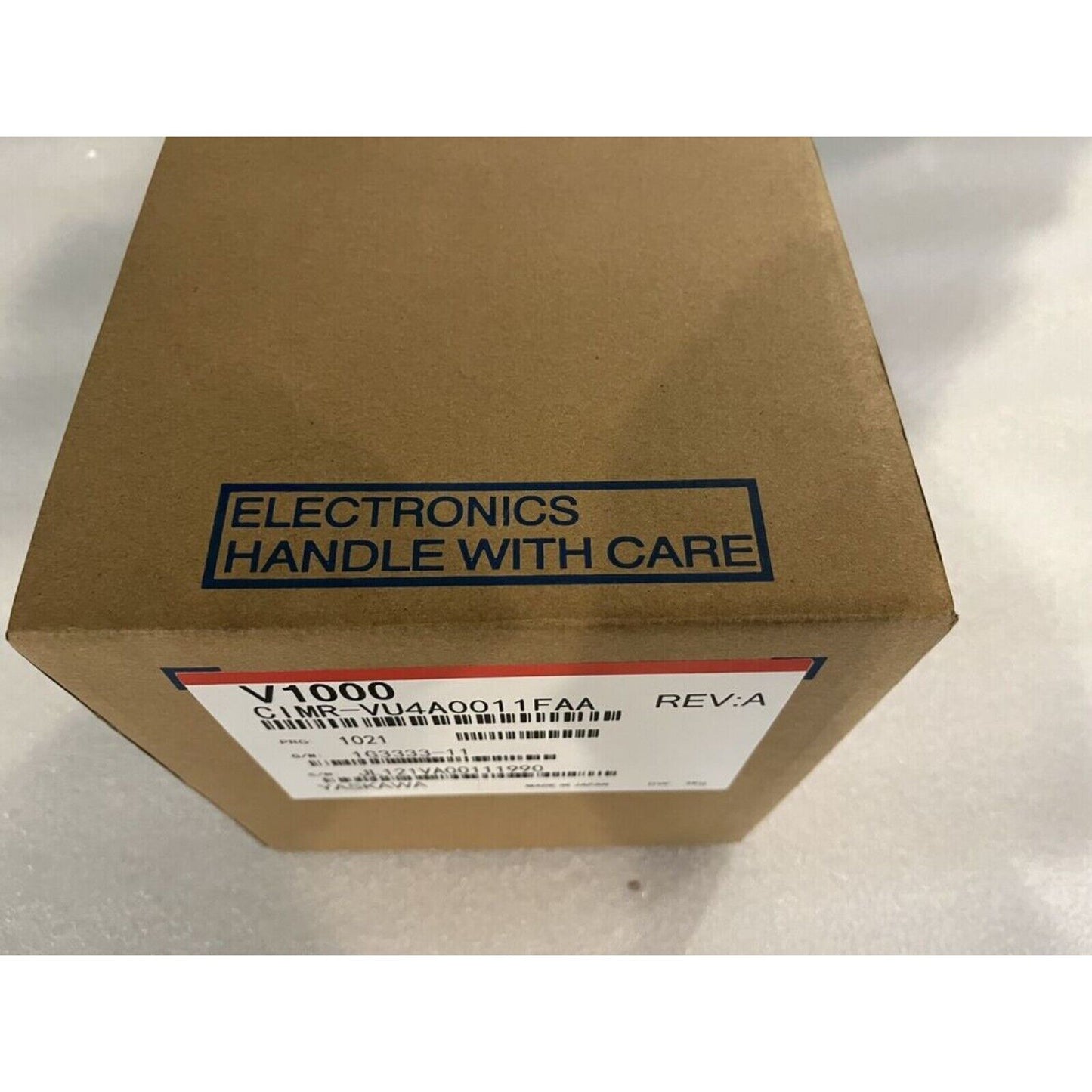 YASKAWA V1000 Inverter CIMR-VU4A0011FAA in box with "Electronics Handle With Care" label, industrial automation part