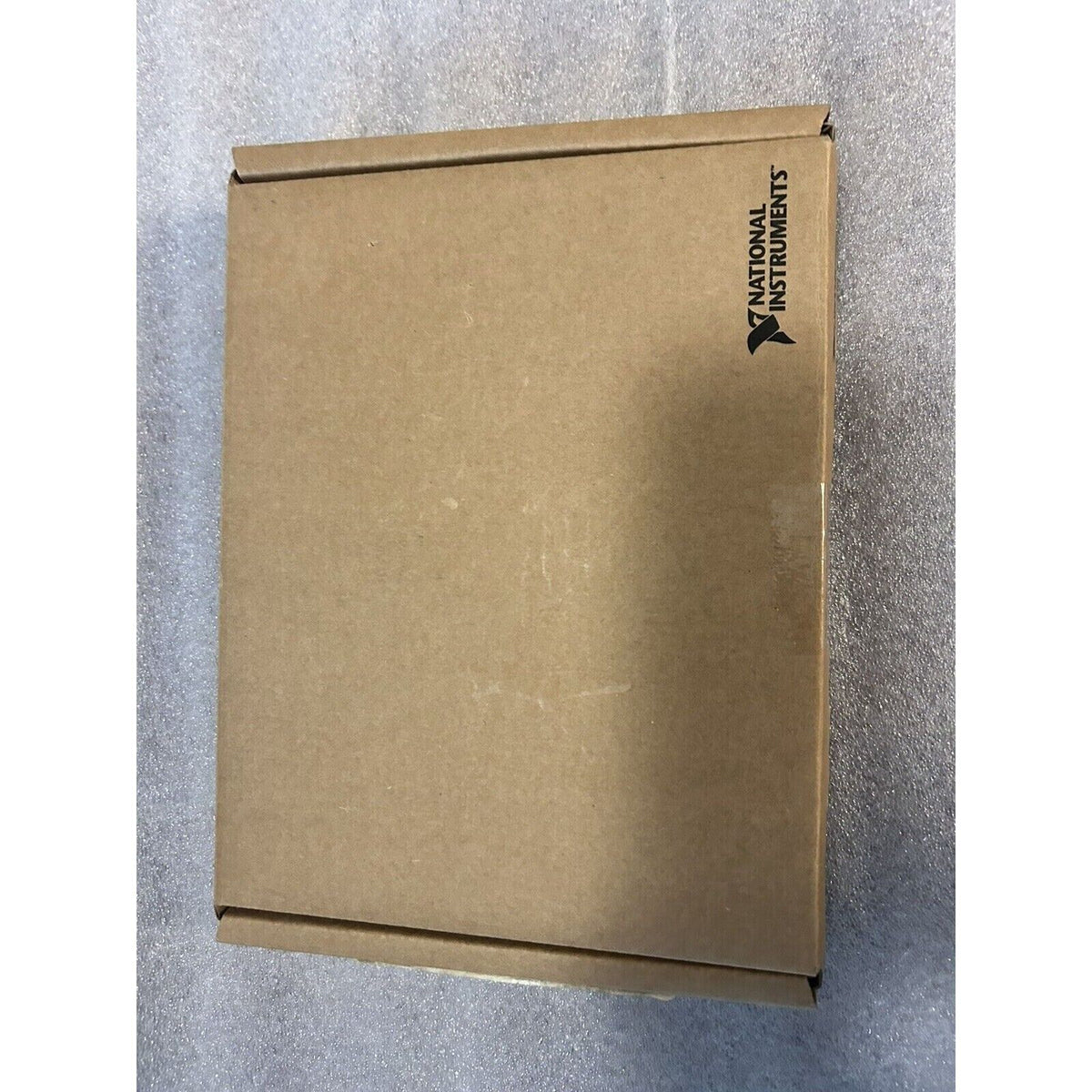 National Instruments NI-9214 product packaging, brown cardboard box