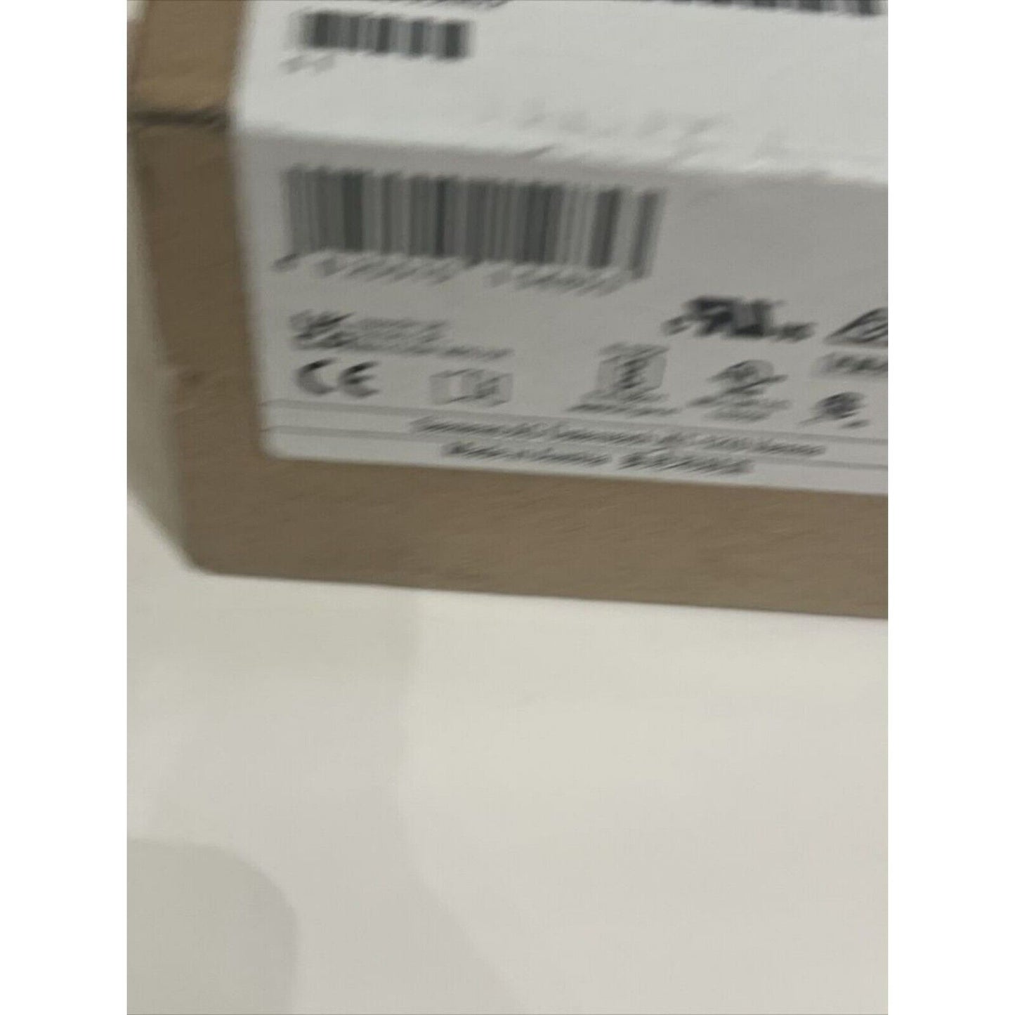 Siemens power supply box with barcode label and CE marking, PLC component.