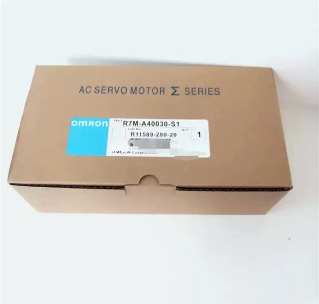 Omron R7M-A40030-S1 AC Servo Motor in box, new condition. Includes product details and serial number.