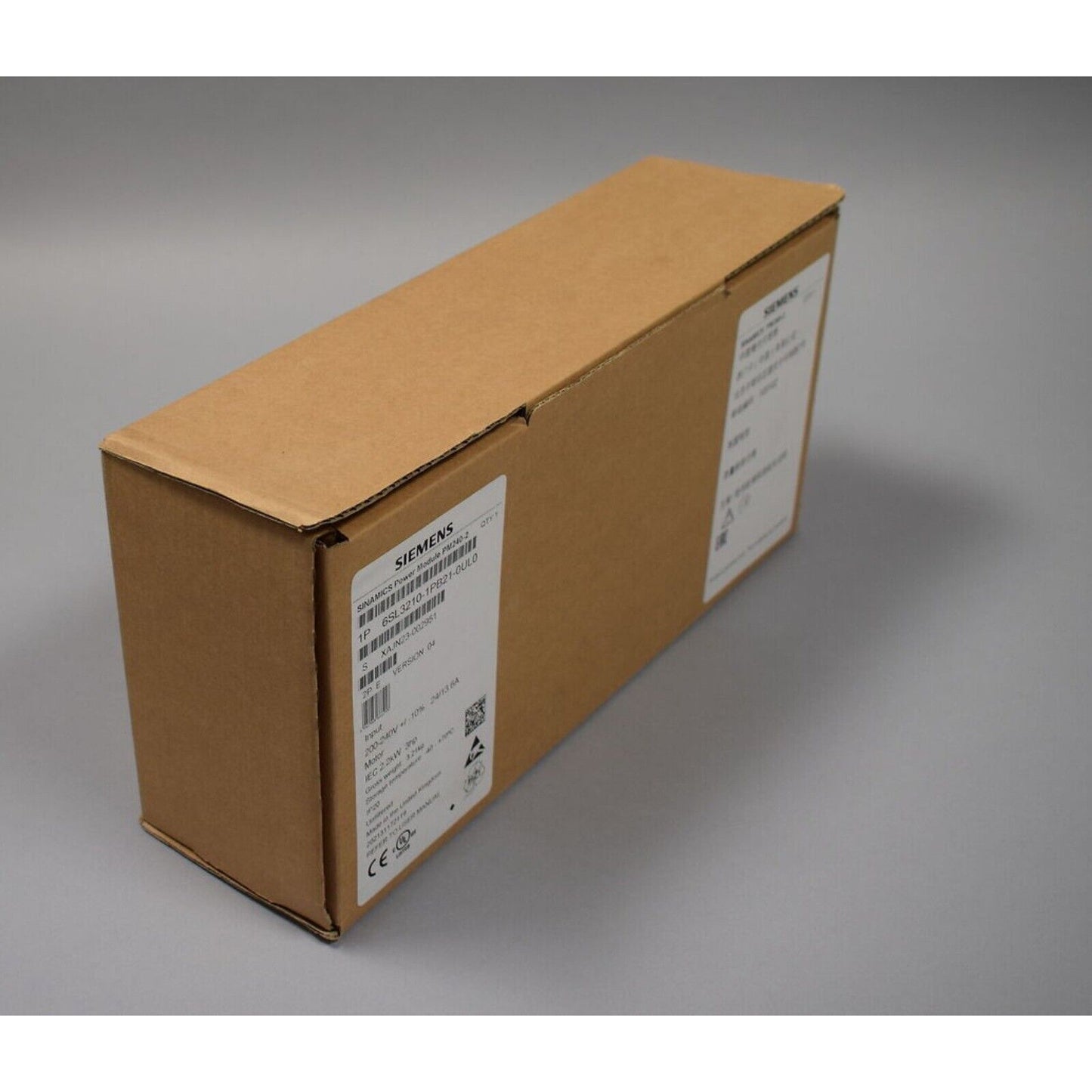 Siemens SINAMICS Power Module PM240-2 in brown cardboard box, industrial automation part