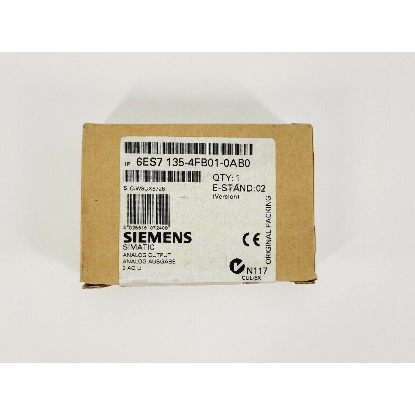 Siemens SIMATIC 6ES7 135-4FB01-0AB0 analog output module in original packaging. Industrial automation component.