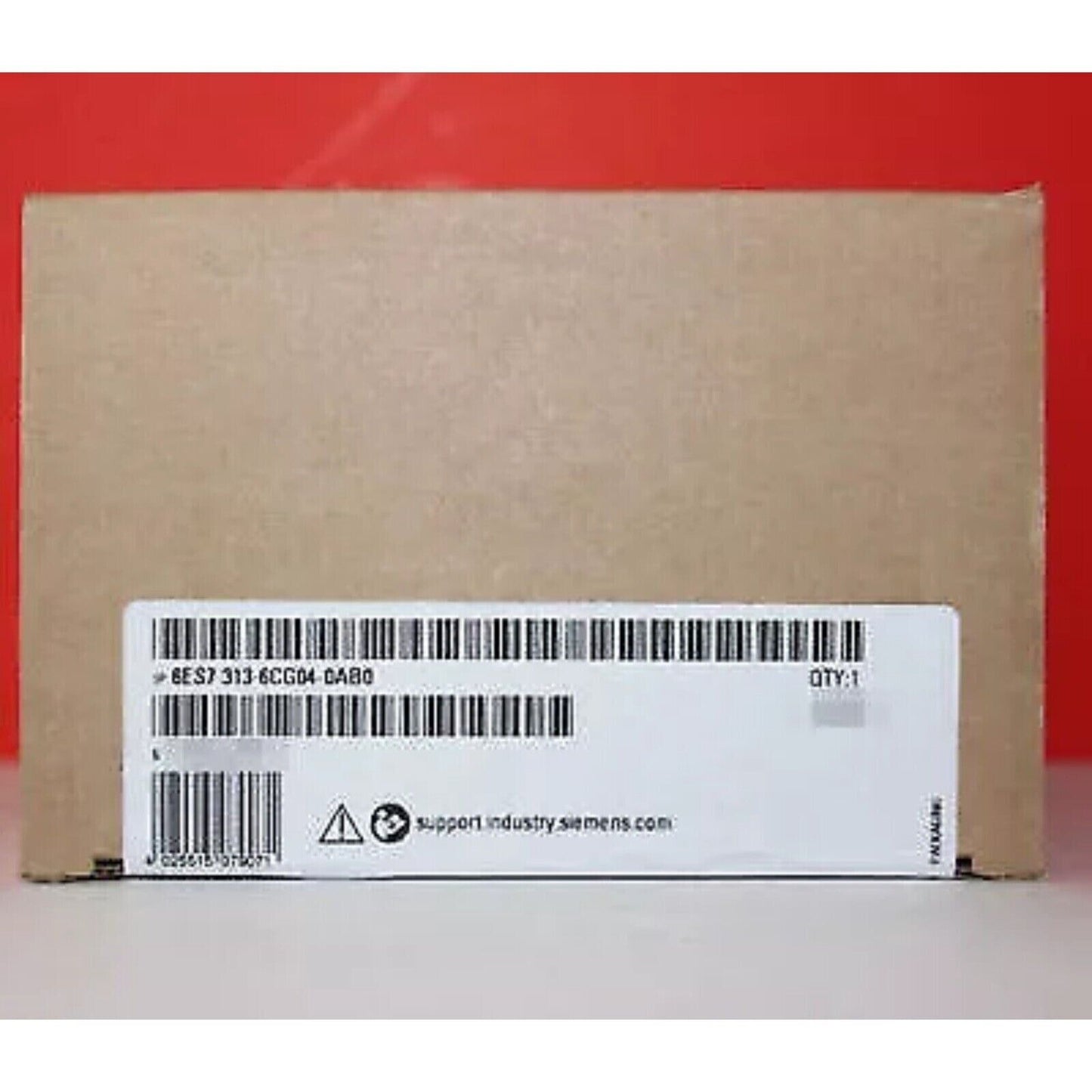 Siemens SIMATIC S7-300 CPU 313C-2 DP box. Product packaging with barcodes and label. Industrial automation
