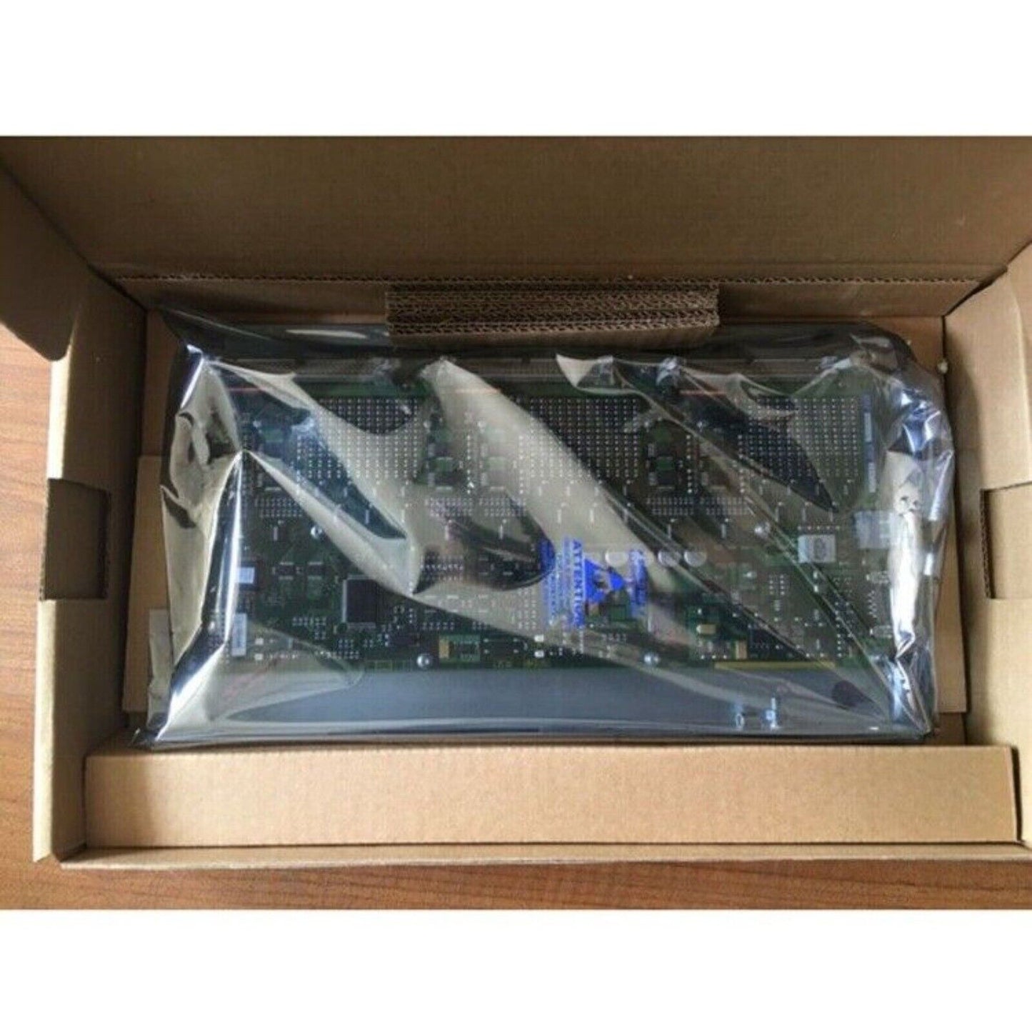 Siemens SINUMERIK I/O Module PP 6FC5611-0CA01-0AA0 in box. Industrial automation PLC module in protective packaging.