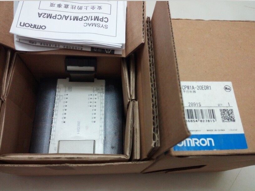 Omron CPM1A-20EDR1 PLC in box, industrial automation control part, with safety instructions