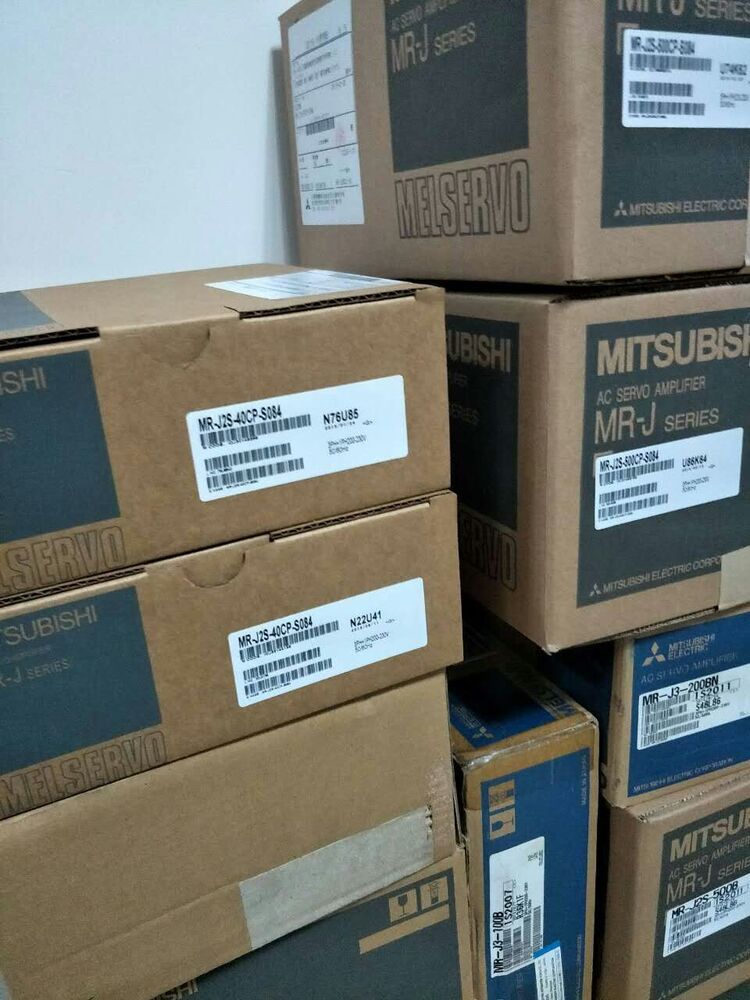 Mitsubishi MR-J2S-40CP-S084 servo drive boxes, new industrial automation parts for sale.