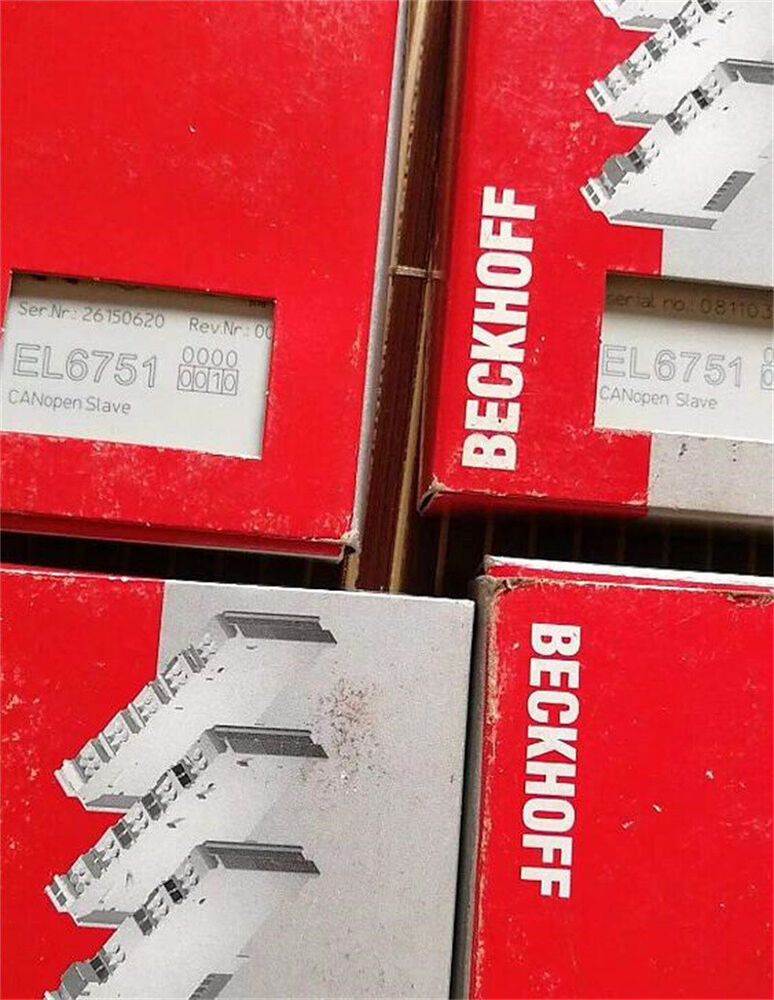 Beckhoff EL6751-0010 I/O Module. Red and white packaging with product details, CANopen Slave.