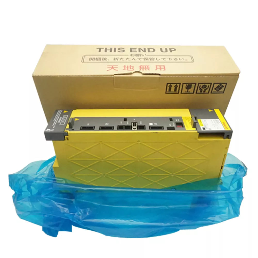 FANUC A06B-6200-H011 Servo Drive in packaging, with labels and text 'THIS END UP' and '天地無用', fast shipping.