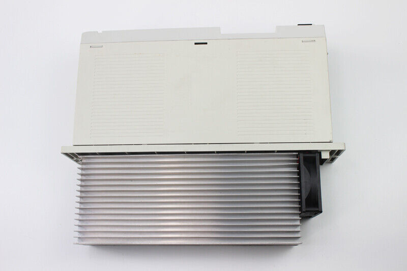 Mitsubishi MDS-B-V1-45 Servo Drive. Industrial automation component with heat sink and fan.