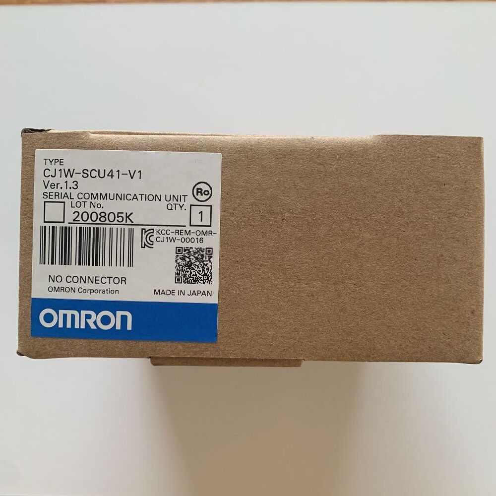 Omron CJ1W-SCU41-V1 PLC Module in its original packaging, with product details, serial number, and brand logo.