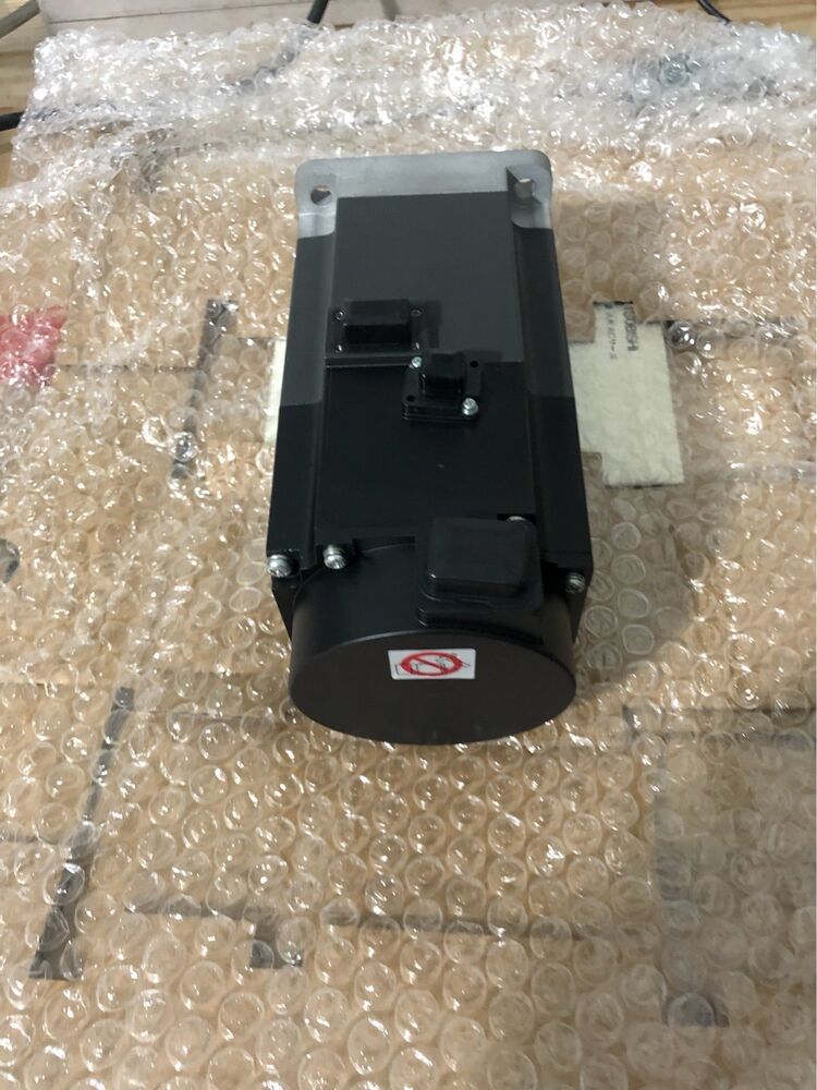 Mitsubishi HG-KN73BJ-S100 AC Servo Motor, black industrial automation part in bubble wrap, new stock.
