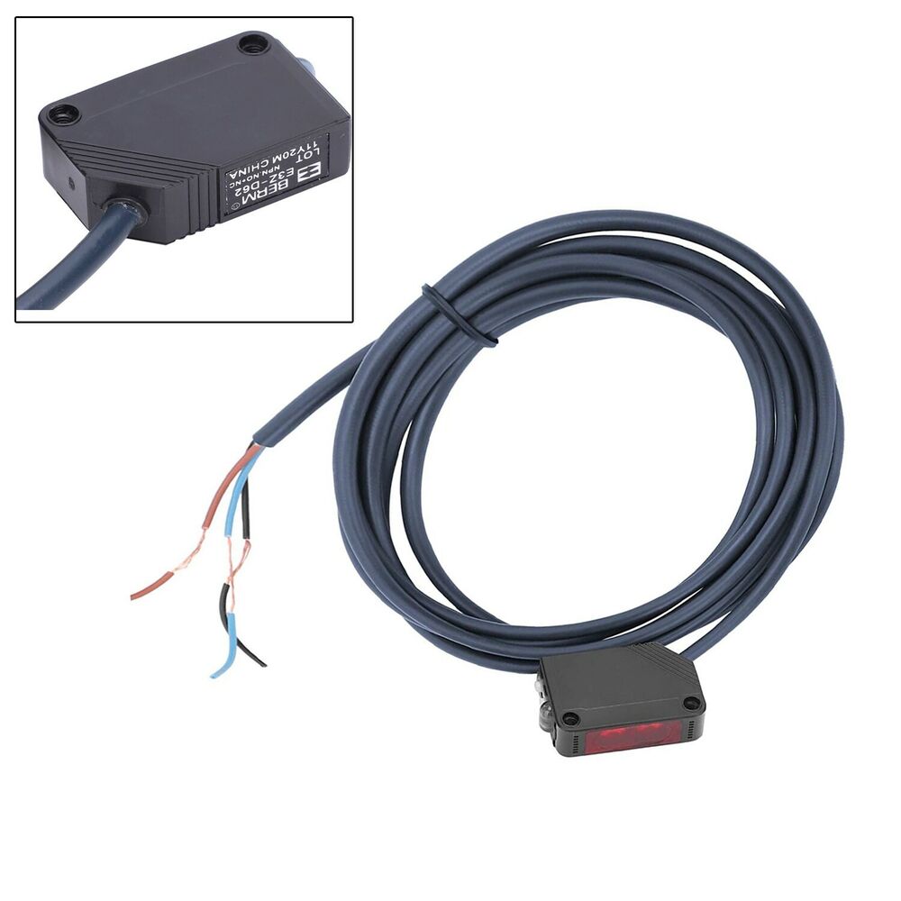 Omron E3Z-D62 photoelectric sensor with black housing, cable, and exposed wiring. Industrial automation component.