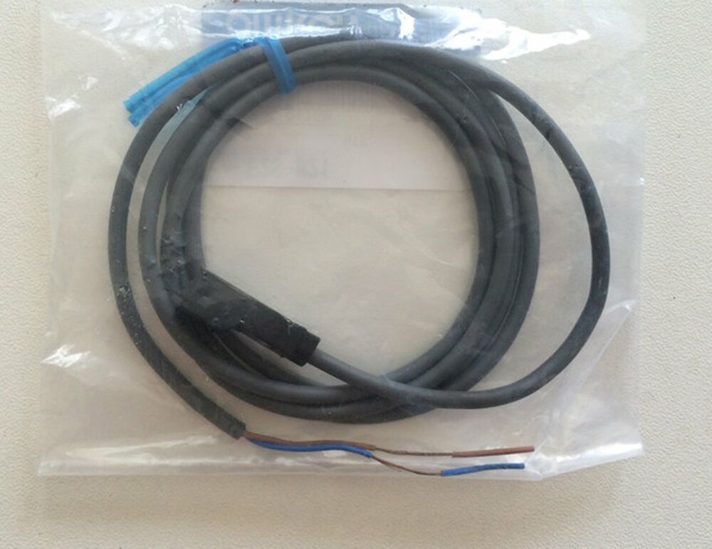 Omron E2S-W21 Proximity Switch cable assembly in packaging, new industrial automation part.