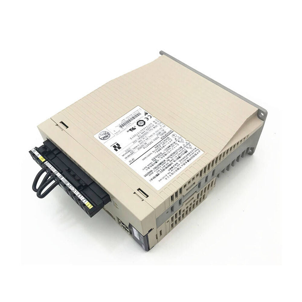 Yaskawa SGDV-5R5A11A Servo Drive. Beige industrial automation component, connectors, and model labels.