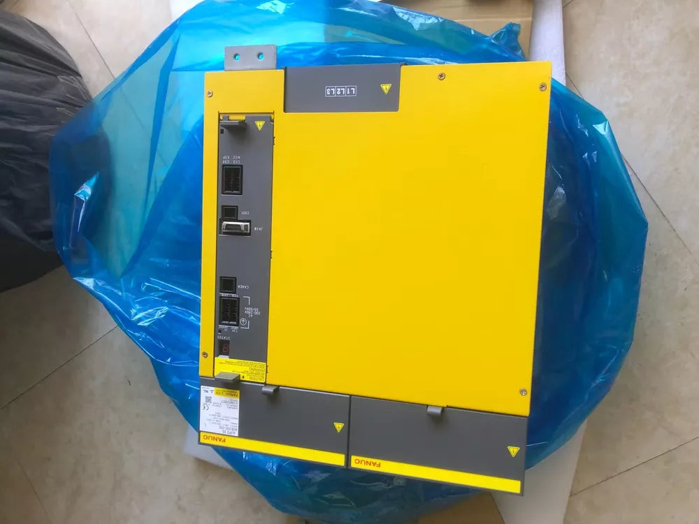 FANUC A06B-6140-H055 Servo Amplifier, yellow and gray industrial automation part, new condition, expedited shipping.