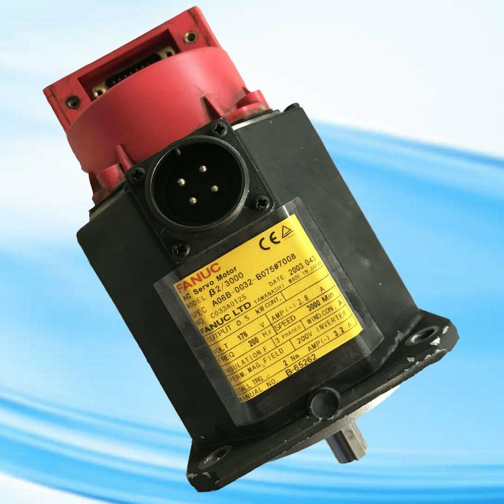 FANUC A06B-0032-B075#7008 Servo Motor, industrial automation part, black and red with product label.
