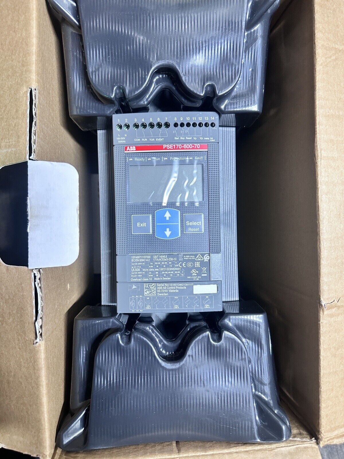 ABB PSE170-600-70 soft starter product in packaging. Features buttons, indicator lights, and product information.