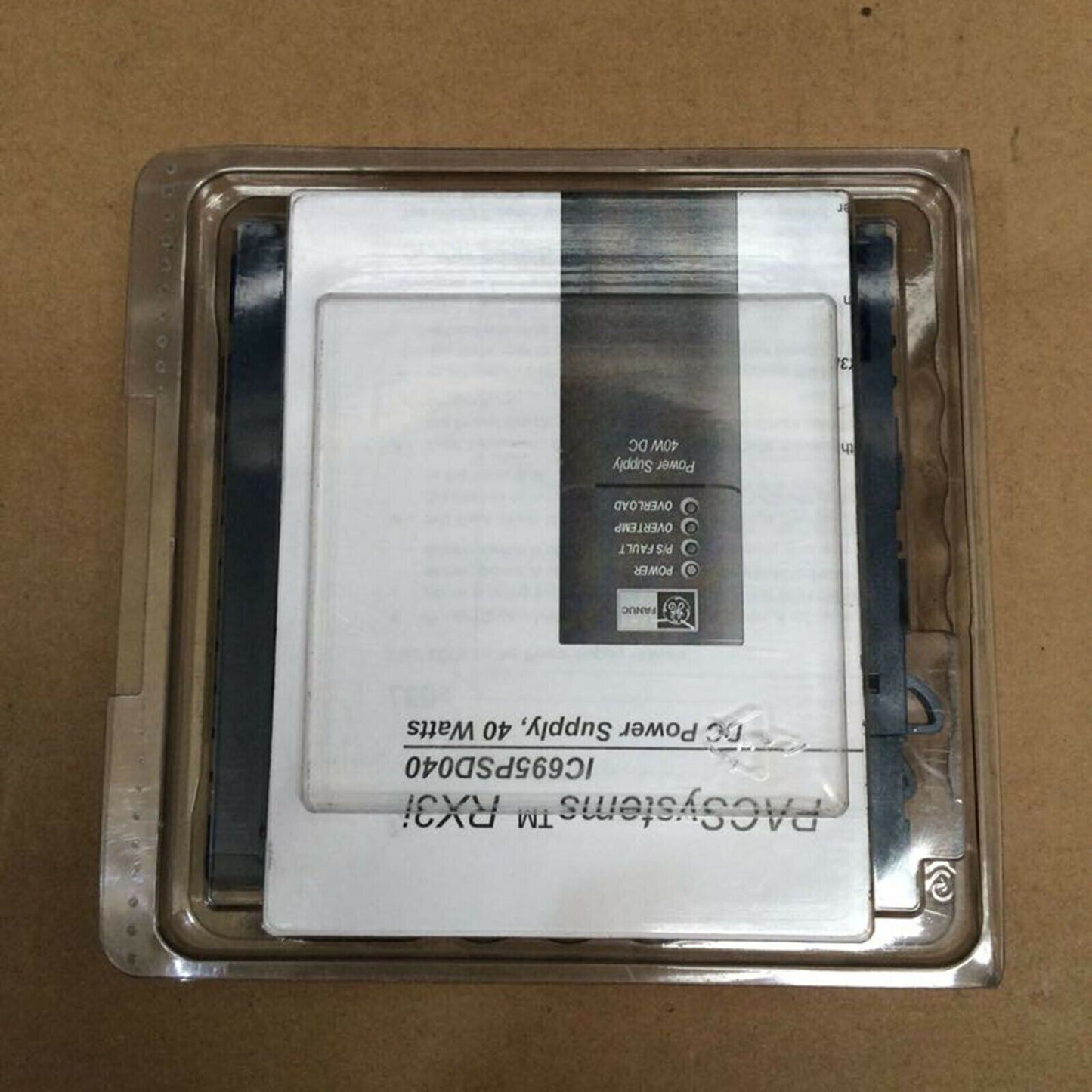 FANUC IC695PSD040F power supply module in protective packaging, industrial automation part