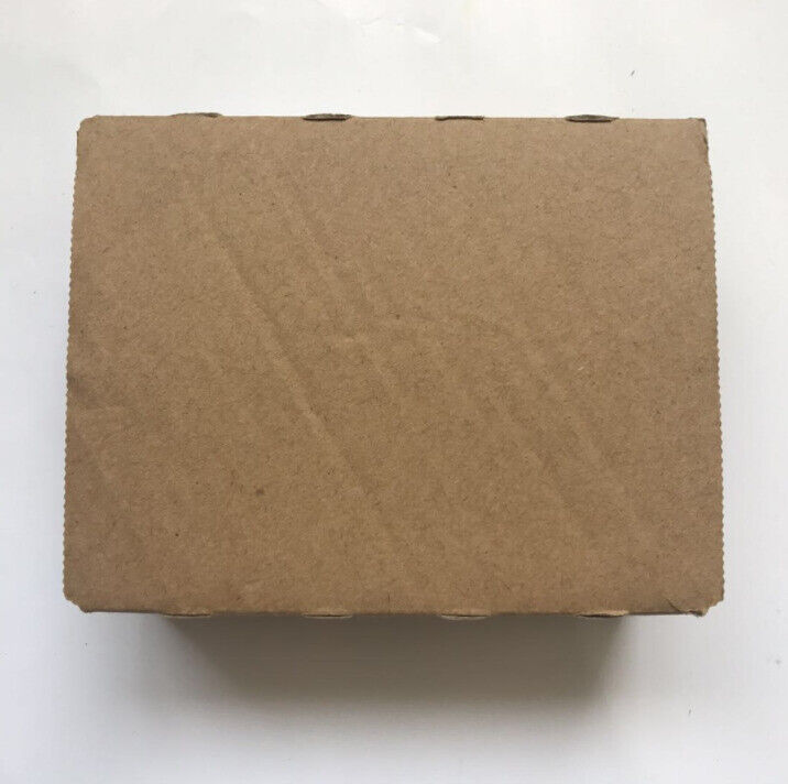 Omron CJ1M-CPU13 PLC in its original brown cardboard box, new condition.