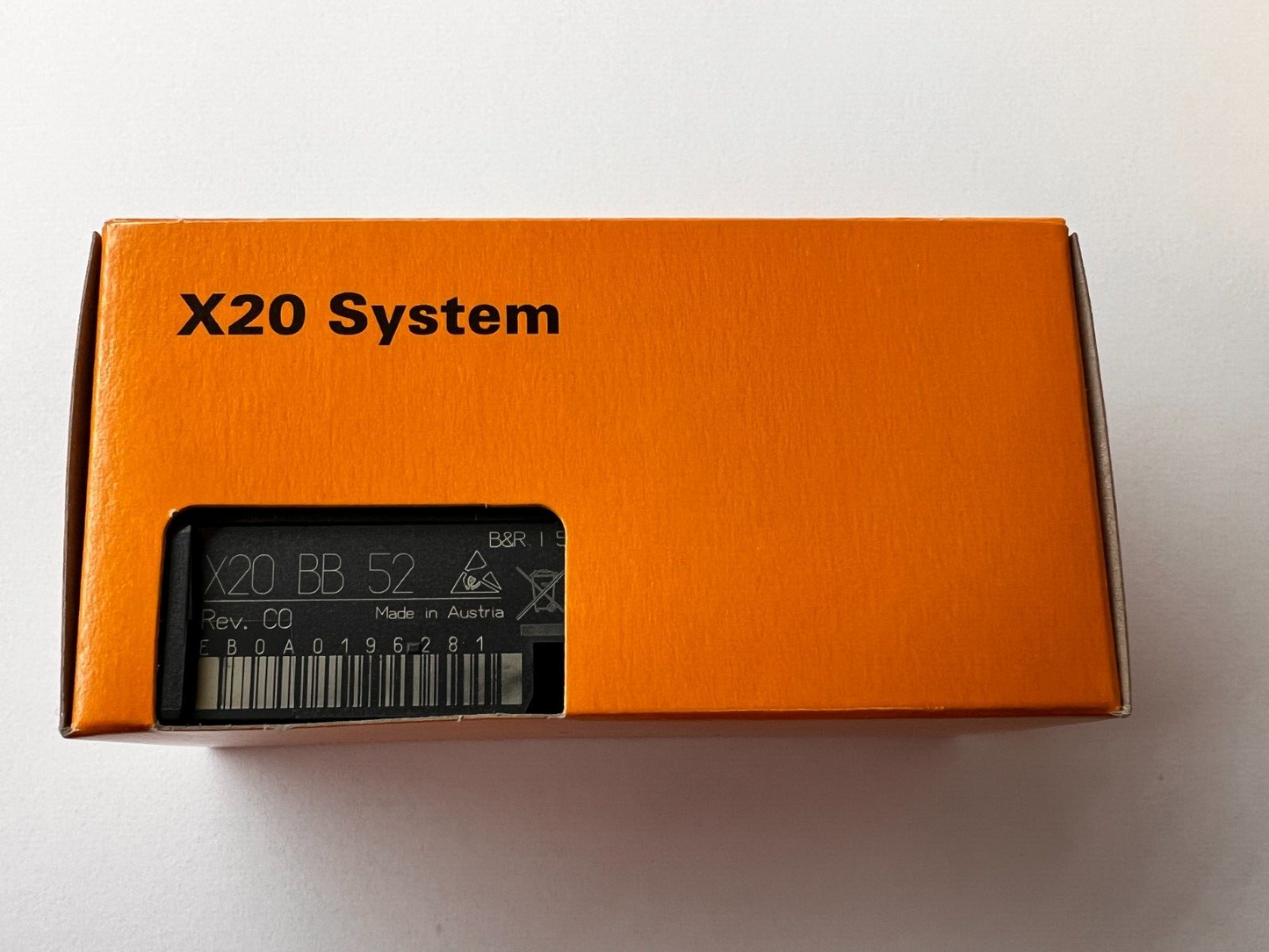 B&R X20 System BB52 bus module in an orange box. X20 Series socket base module.
