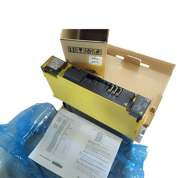 FANUC A06B-6117-H207 Servo Amplifier Module, yellow industrial automation part with box and documents, fast shipping.