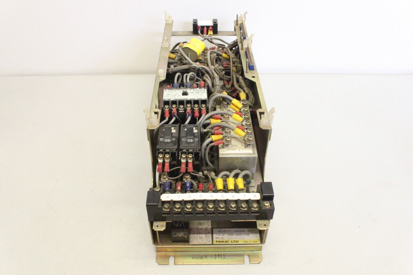 FANUC A06B-6050-H104 velocity control unit with visible electrical components, product shot