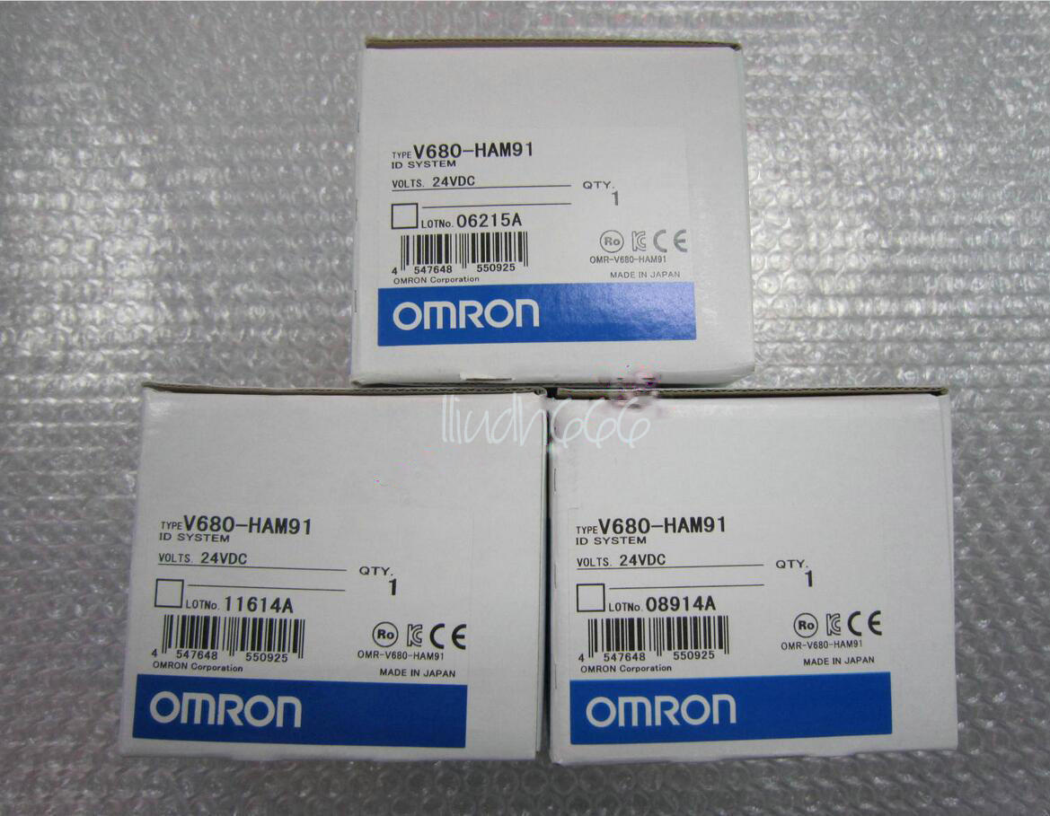 New Omron V680-HAM91 ID System module, 24VDC, showing packaging details with the Omron logo and part number.