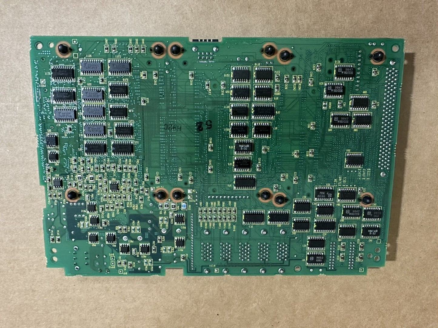 FANUC A20B-8100-0135 Main Board PCB. Green circuit board with electronic components, automation part.