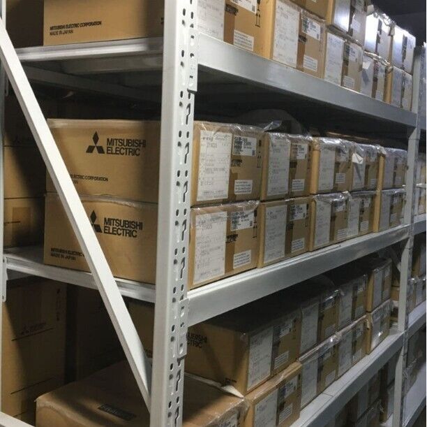 Mitsubishi Electric industrial automation parts in warehouse storage. Boxes ready for shipping, MDS-C1-SPM-185 available.