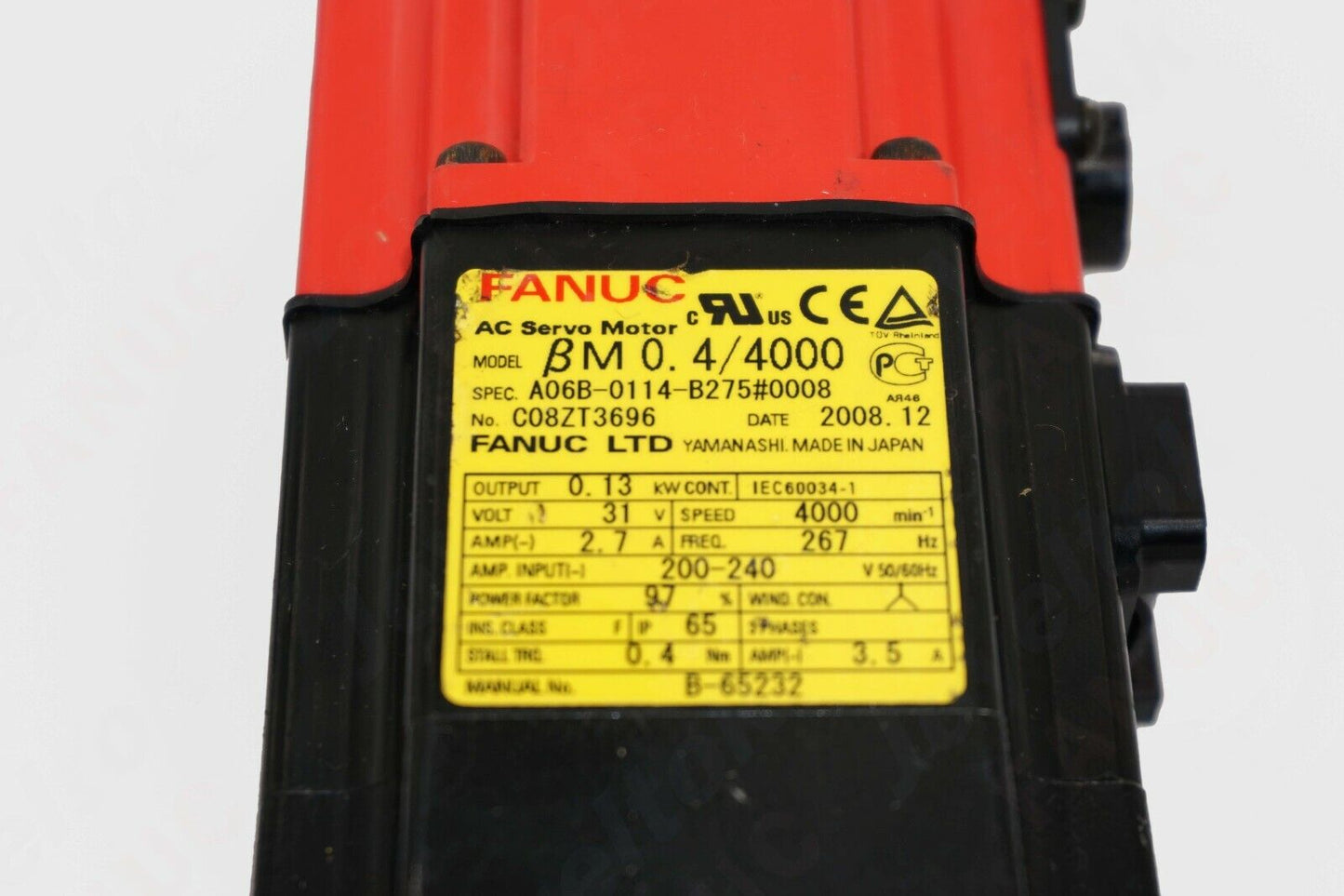 FANUC AC Servo Motor A06B-0114-B275#0008, black and red industrial part, BM 0.4/4000 specification.