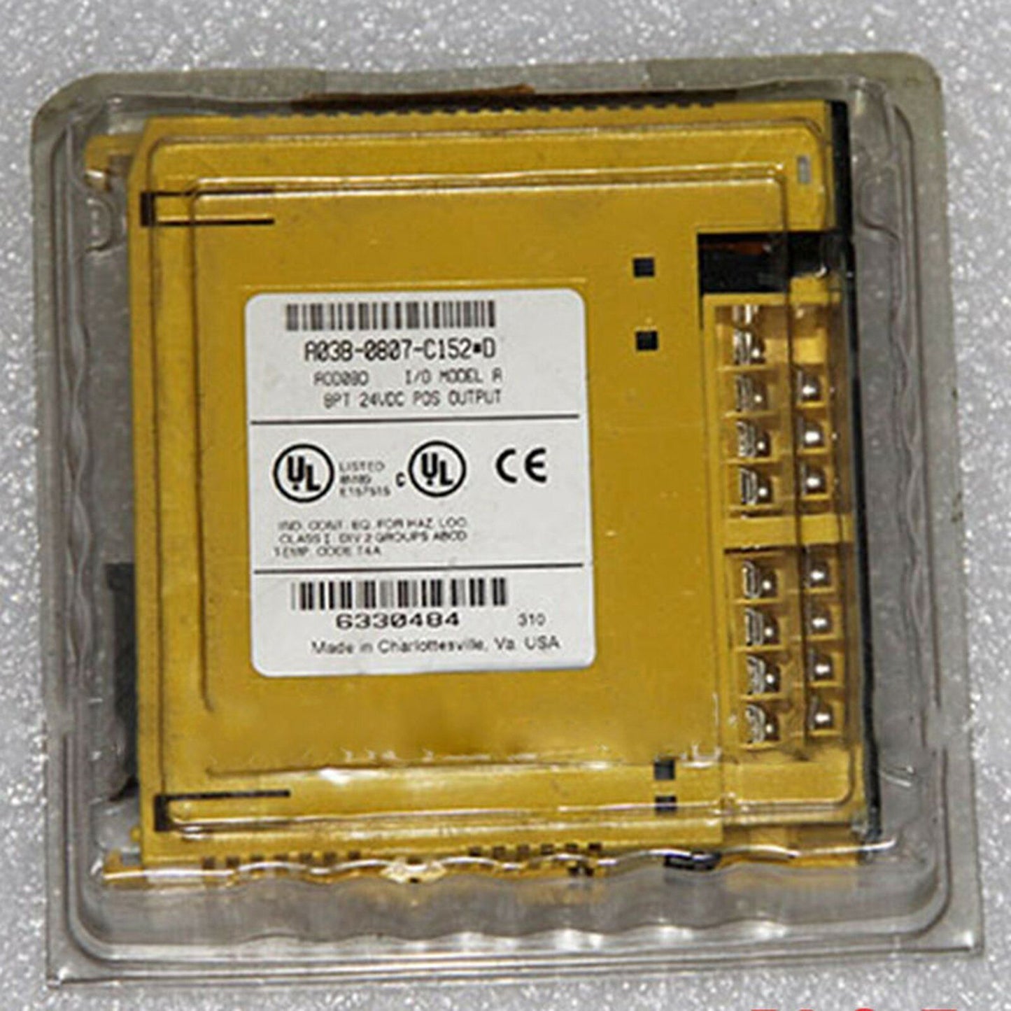 FANUC A03B-0807-C152-D I/O Module - New, Yellow industrial automation part with UL and CE certification.