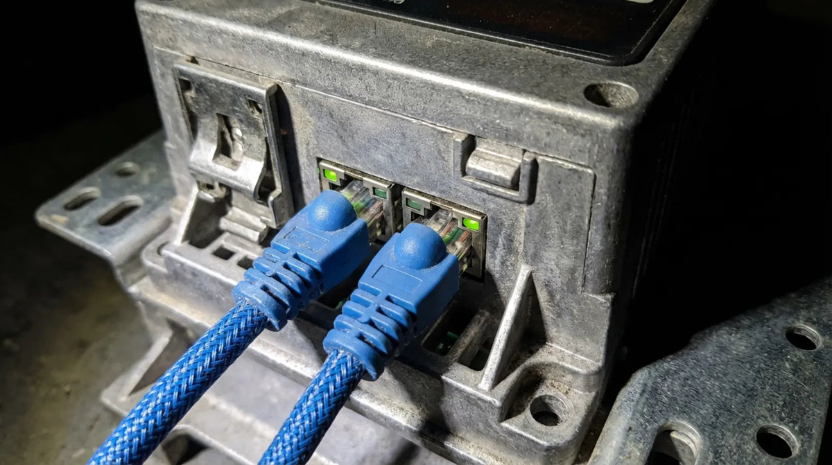 PowerFlex 525 rear panel showing dual EtherNet/IP ports for daisy-chain connection