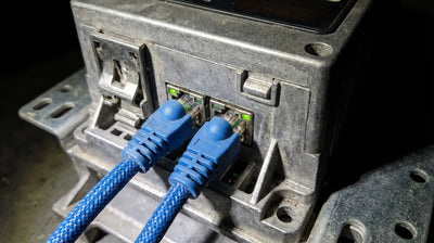 PowerFlex 525 rear panel showing dual EtherNet/IP ports for daisy-chain connection