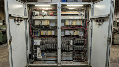 Aging SLC 500 controller rack showing years of service in legacy cabinet