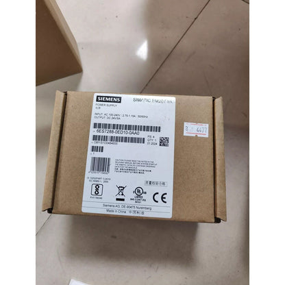 Siemens SIMATIC PM207 5A power supply unit, model 6ES7288-0ED10-0AA0, 24V DC output, in its original brown packaging.