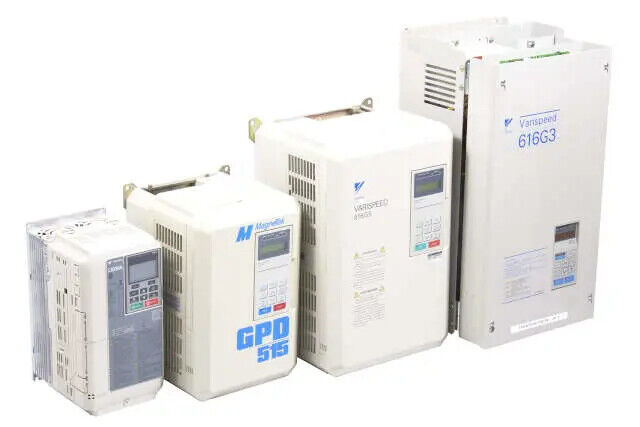 Industrial inverters from Yaskawa, Magnetek GPD 515, and Varispeed 616G3, beige, industrial automation equipment.