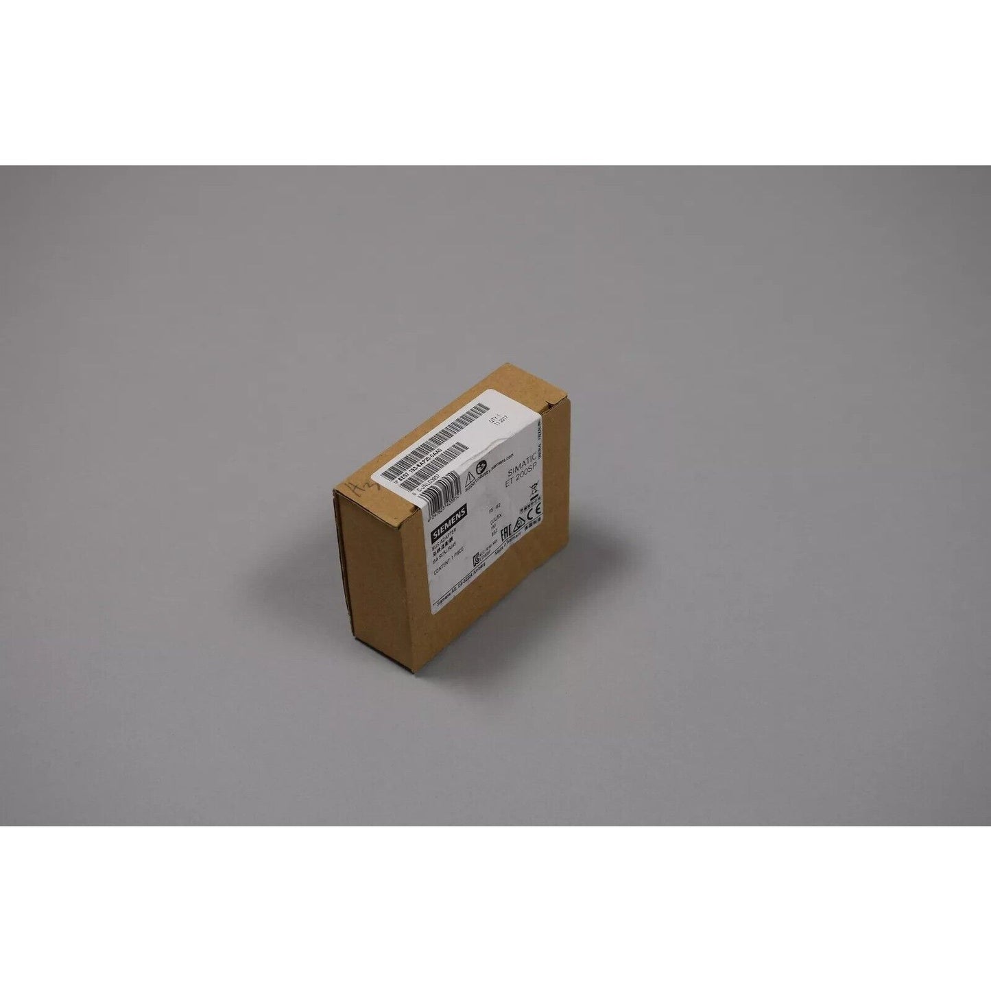 Siemens SIMATIC ET 200SP BusAdapter in brown cardboard packaging, industrial automation part