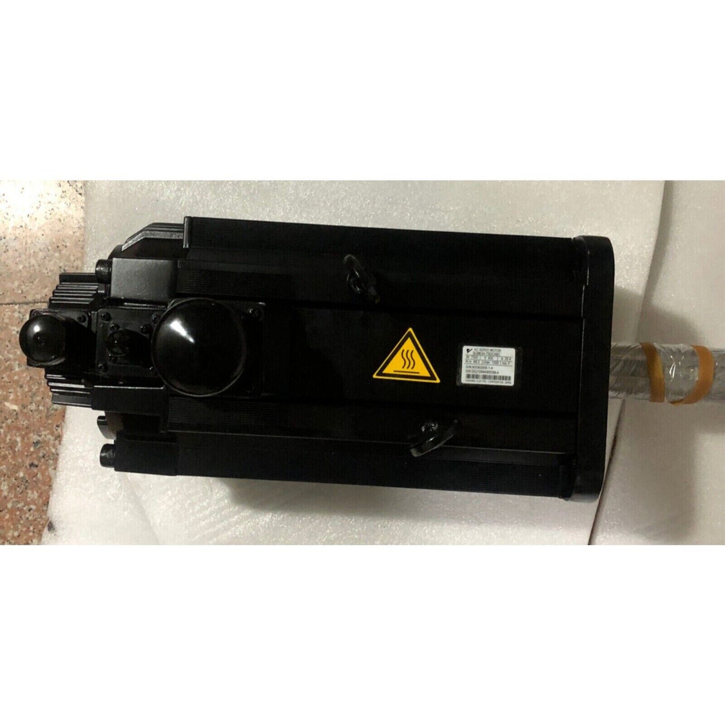 Yaskawa SGMGH-75DCA6C servo motor, black industrial equipment, warning label, expedited shipping