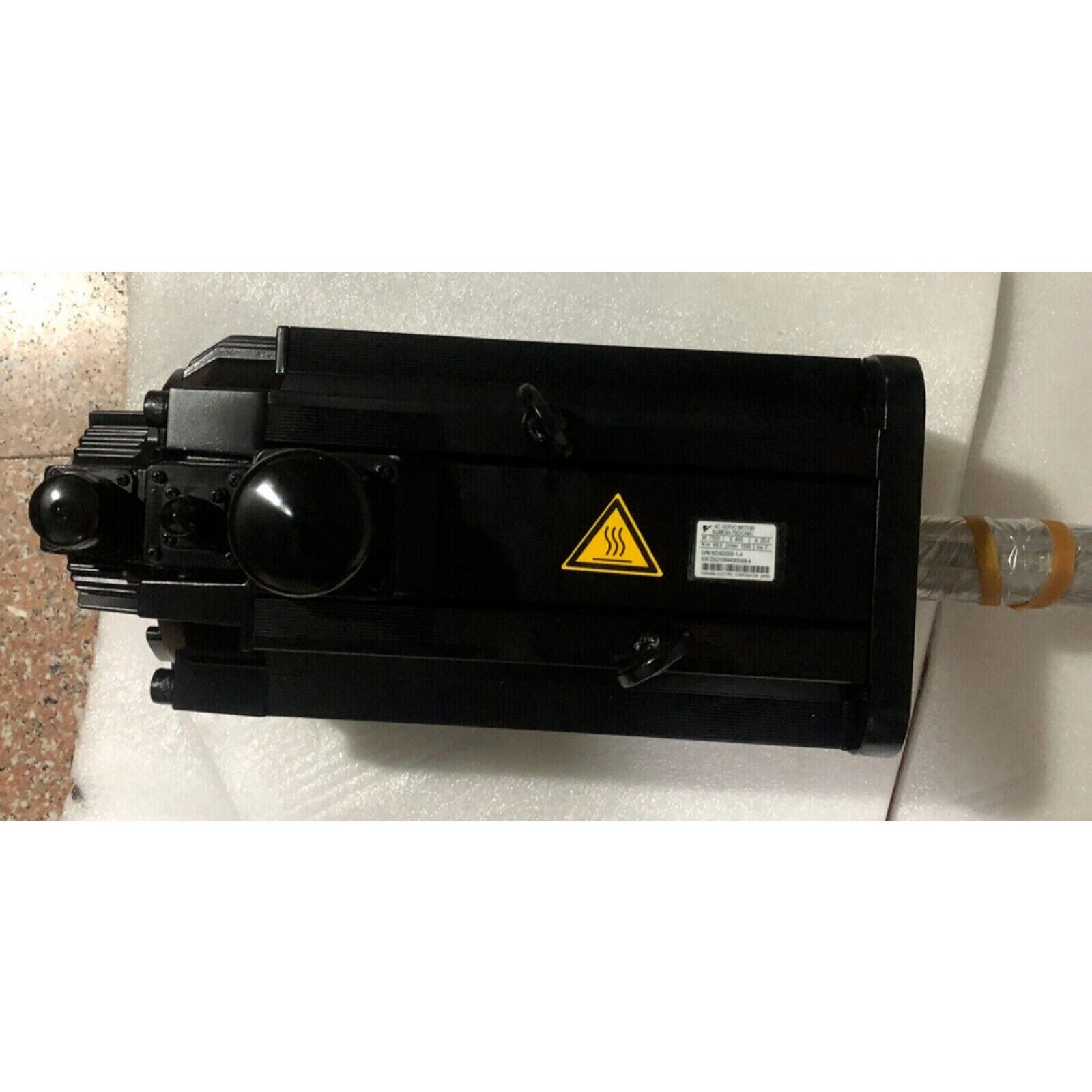 Yaskawa SGMGH-75DCA6C servo motor, black industrial equipment, warning label, expedited shipping