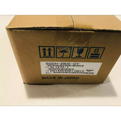 YASKAWA SGDH-20DE-OY servo drive product packaging made in Japan. Features model number, barcode, and shipping symbols.